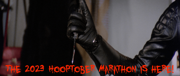 Announcing the 2023 Hooptober kickoff! Bloody letters announce it with a leather gloved hand holding a knife in the background