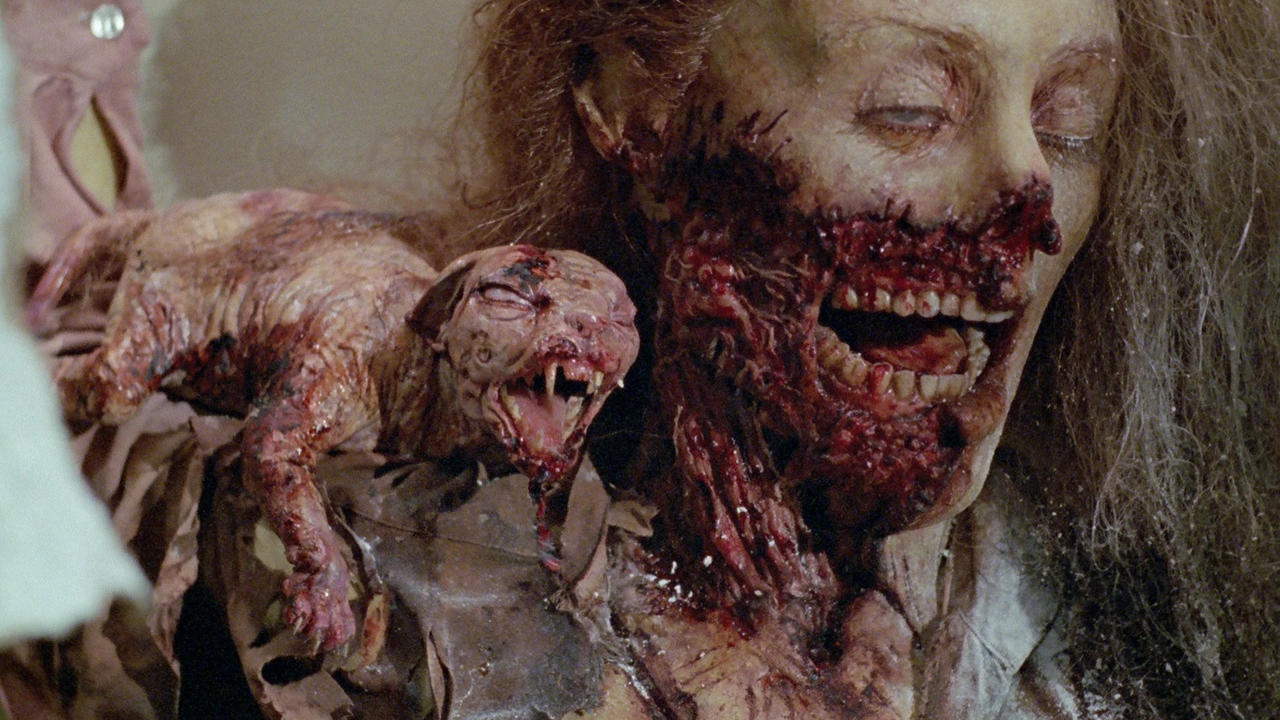 two evil eyes image of the dead wife and the zombie cat