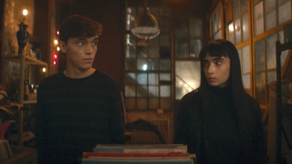humanist vampire header - a boy and a girl looking at each other as a record plays. the girl is a vampire